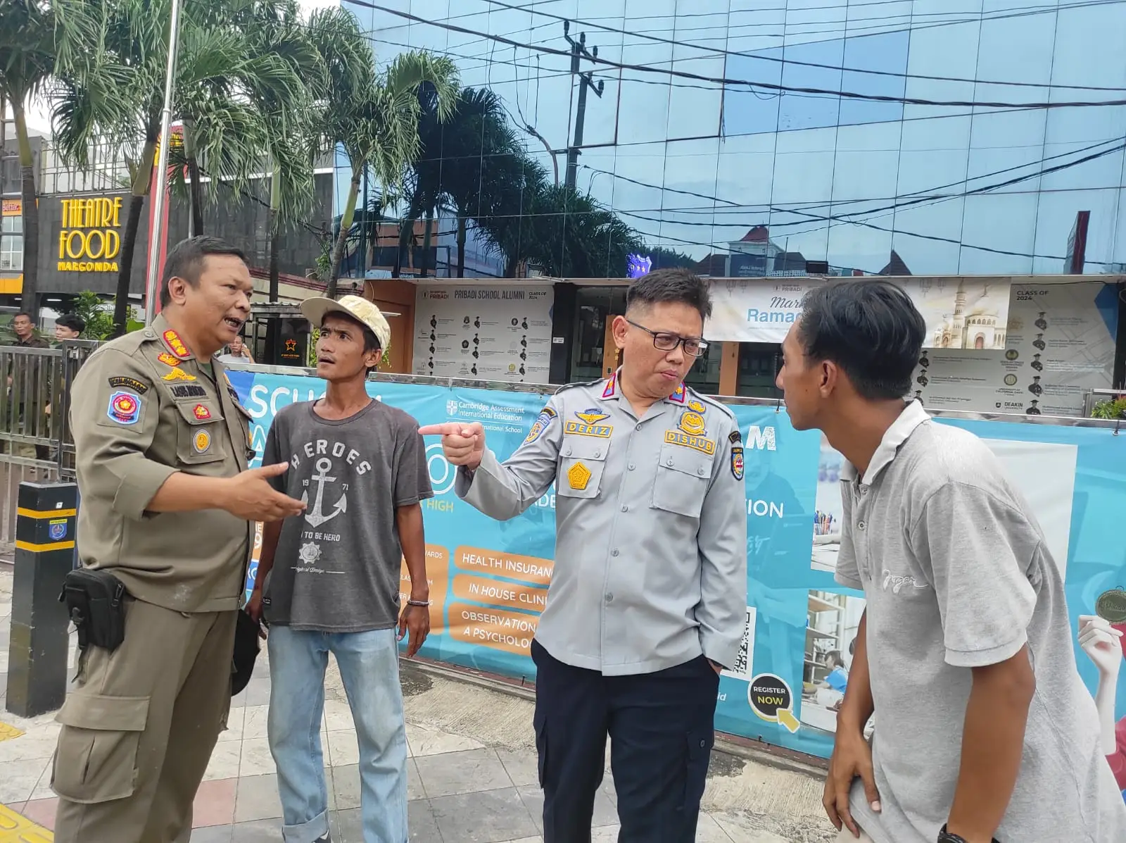 Respons Keluhan Warga, Petugas Gabungan Tertibkan Pak Ogah di Jalan Margonda Raya