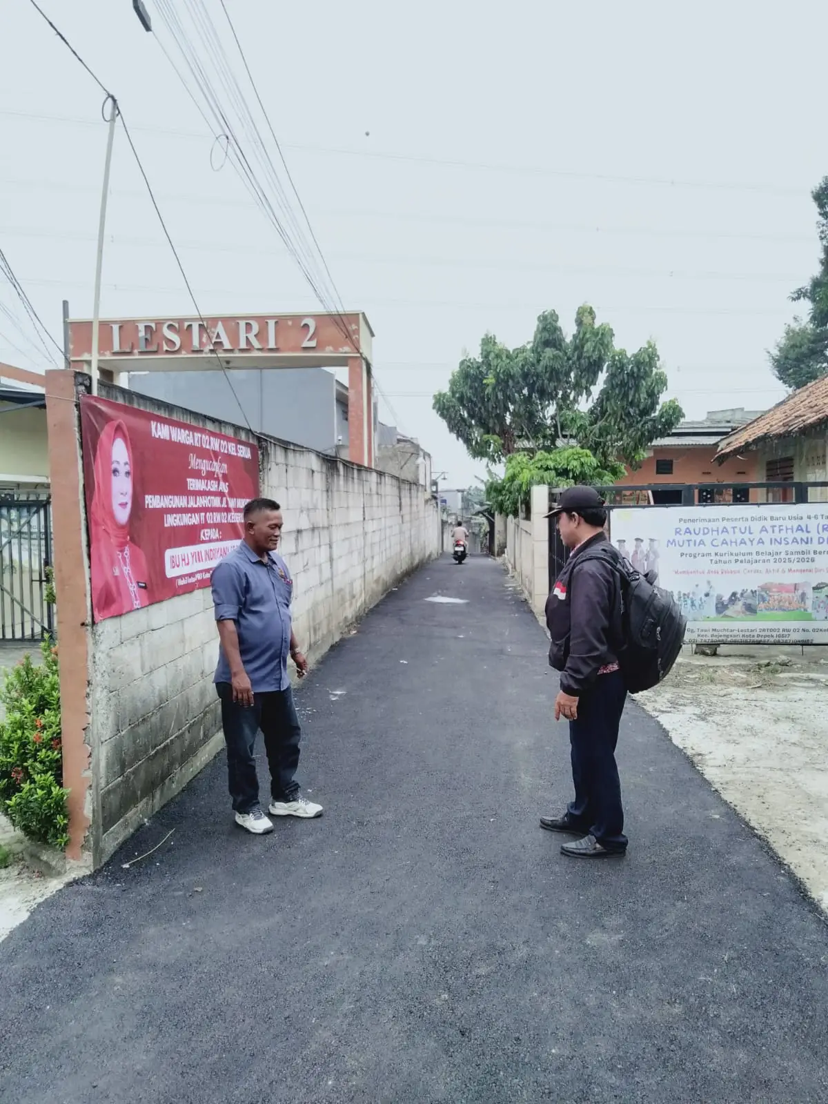 Warga Serua Nikmati Jalan Tawi Mukhtar Mulus Dihotmix Berkat Pokir Wakil Ketua DPRD Yuni Indriany