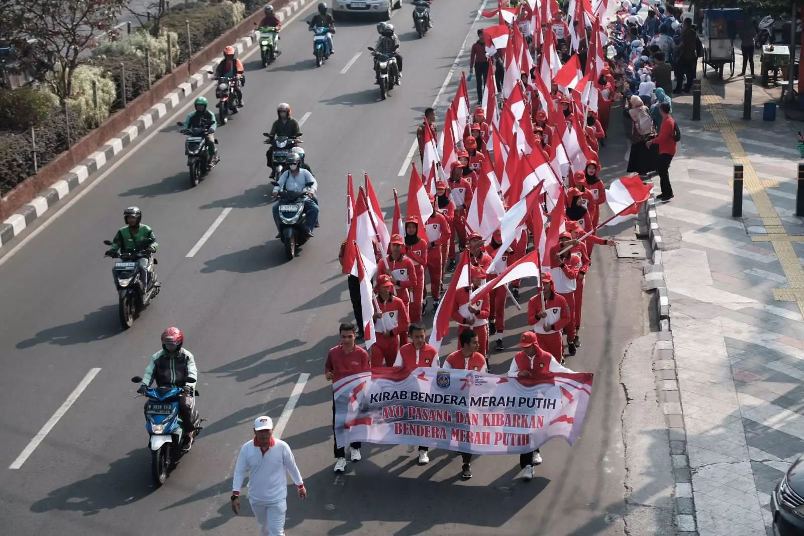 Berlangsung Meriah, Kirab Bendera Merah Putih Tuangkan Semangat Kemerdekaan