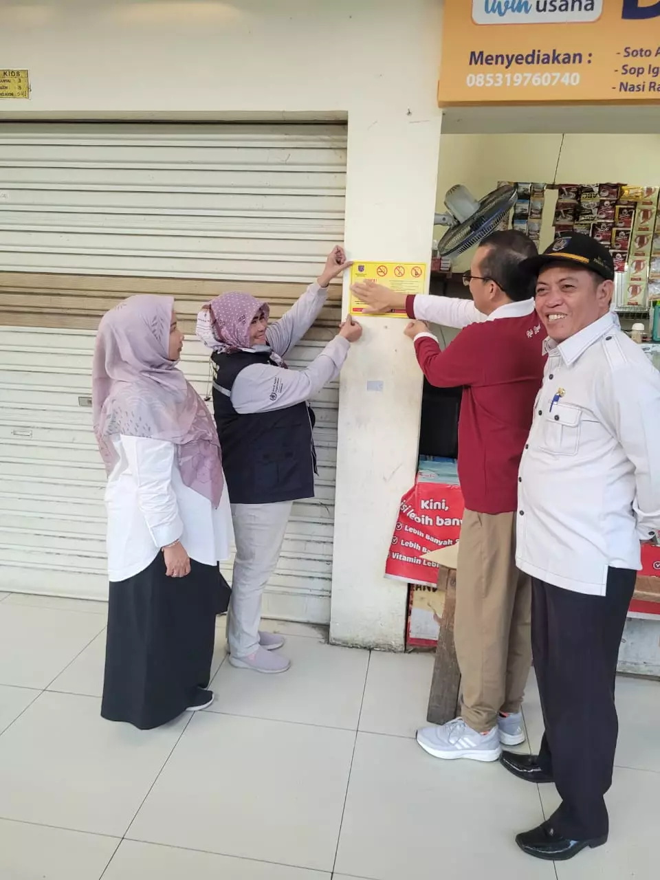Disdagin Kampanyekan KTR dan Gerakan Berhenti Merokok di Pasar Tradisional